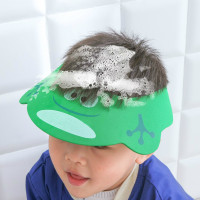 Дитячий регульований козирок для миття голови та стрижки Baby Shower Cap · Захисна шапочка для купання дитини